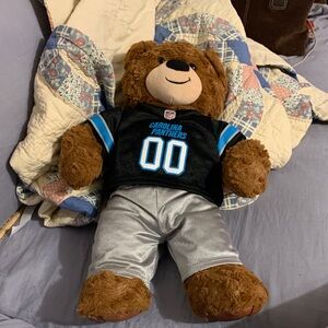 Build a Bear Football Brown curly hair bear in his Carolina Panthers NFL BAB fit
